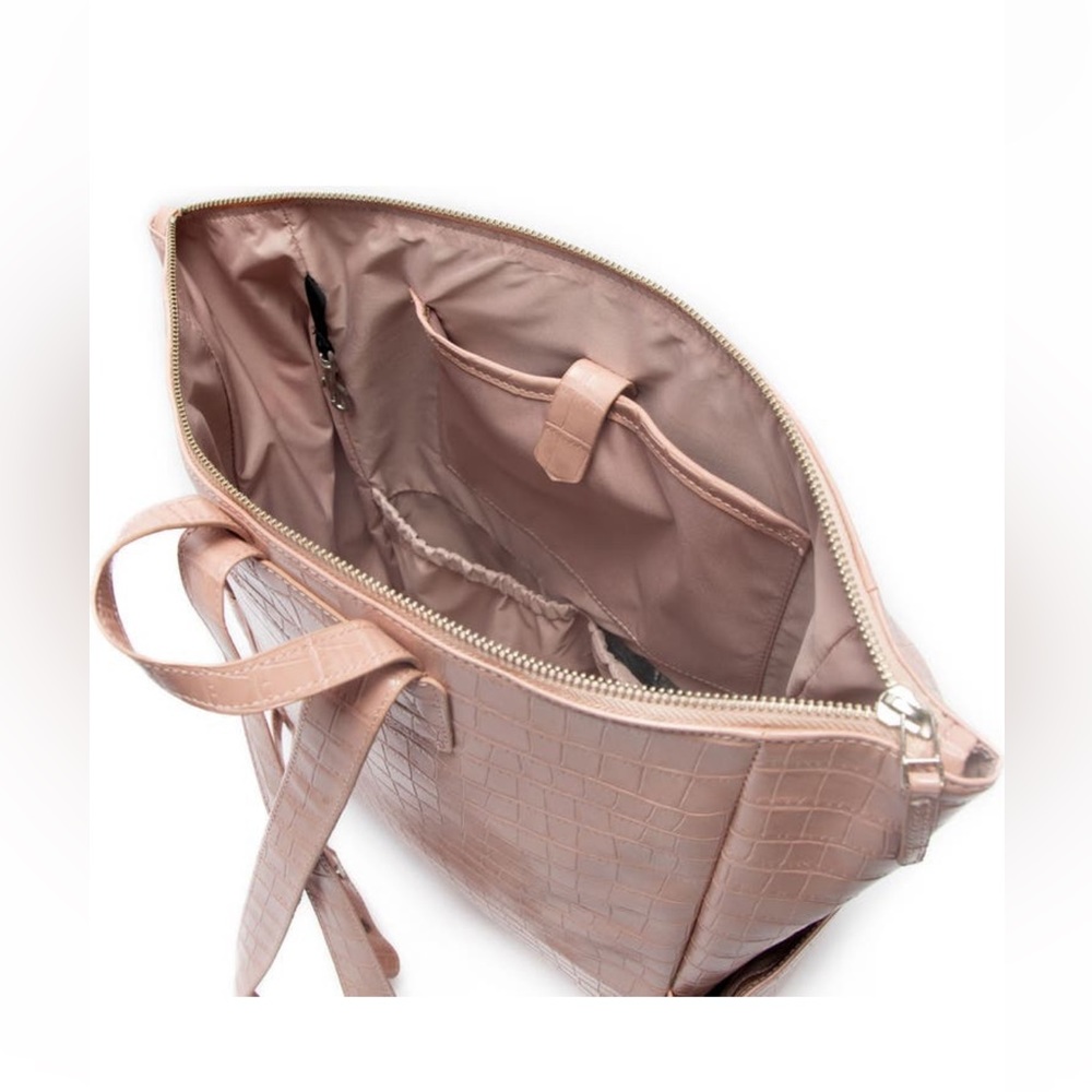 Minimal Water Resistant Faux Leather Diaper Backpack
FRESHLY PICKED - Picture 4 of 9